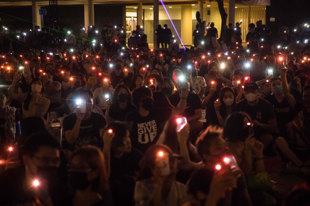 People attend a prayer rally to show support for pro-democracy protesters in Hong Kong on October 14, 2019.  AFP / DALE DE LA REY