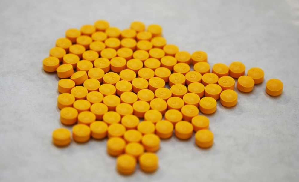 Tablets believed to be laced with fentanyl are displayed at the Drug Enforcement Administration Northeast Regional Laboratory on October 8, 2019, in New York. AFP / Don Emmert 
 