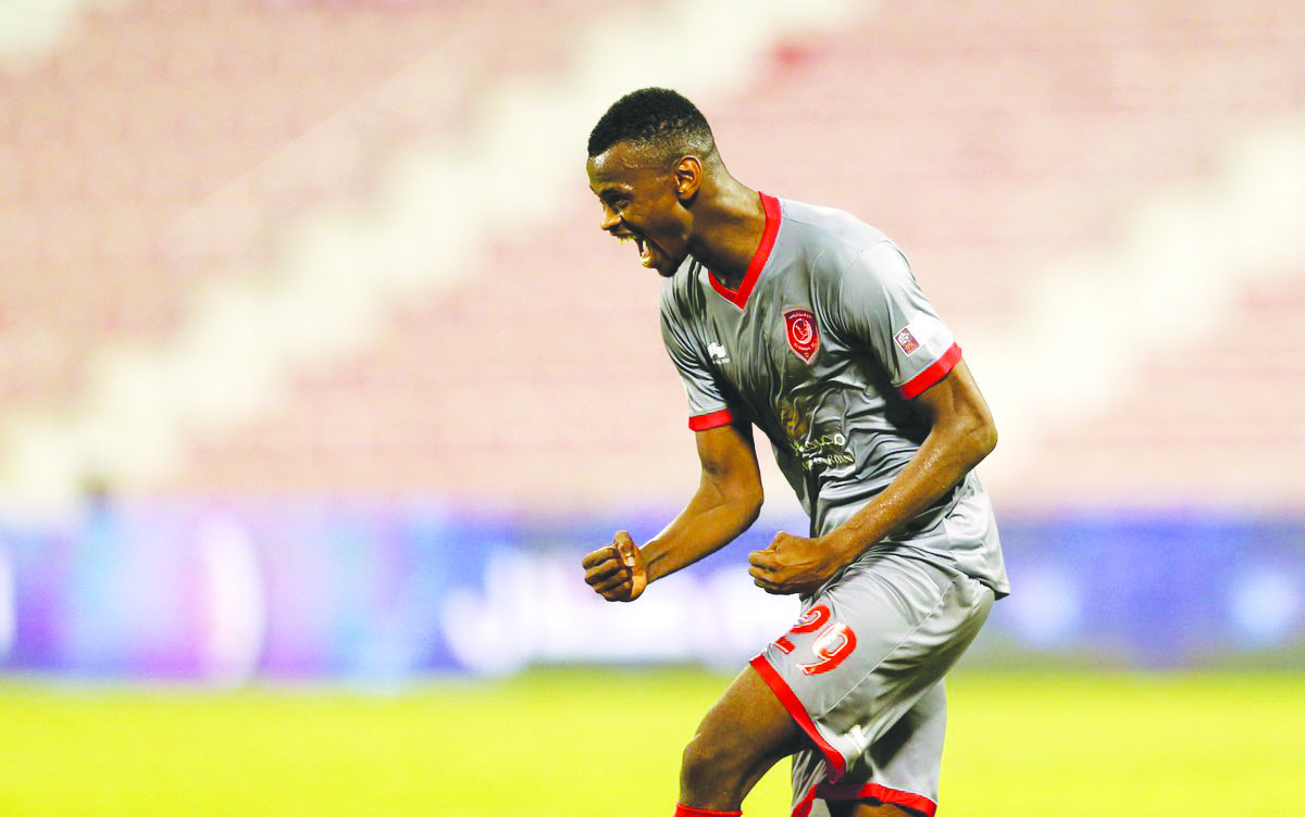 Al Duhail’s Mohammed Muntari celebrates after scoring their winning goal against Umm Salal during the QNB Stars League match played at the Al Arabi Stadium, yesterday.