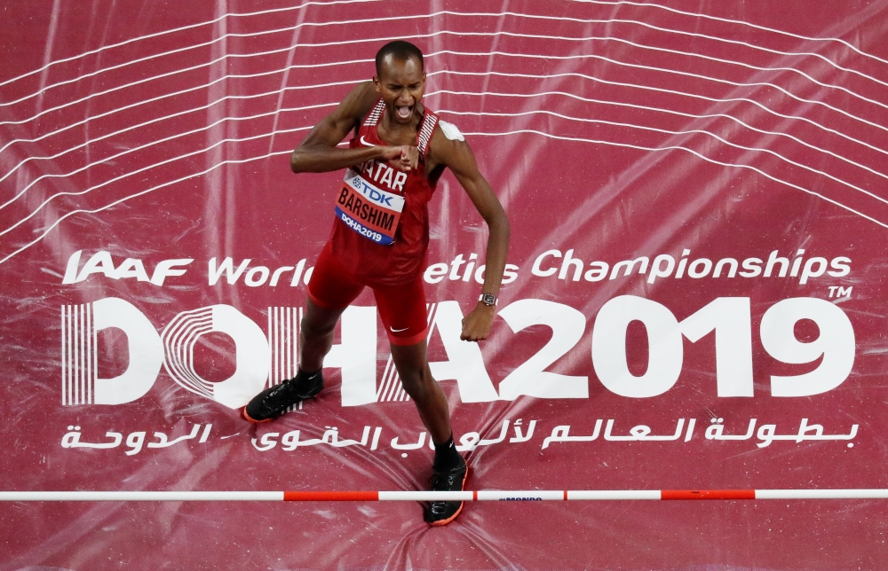 Mutaz Essa Barshim reacts after winning gold in High Jump final at World Athletics Championships at Khalifa International Stadium, Doha, Qatar October 4, 2019. Reuters/  Pawel Kopczynski.jpeg