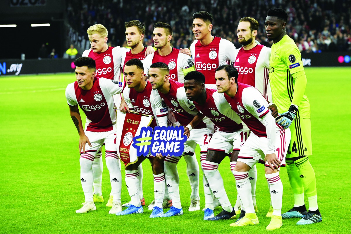 Ajax’s players pose for a team photo prior to the UEFA Champions League Group H match against Chelsea last Wednesday.