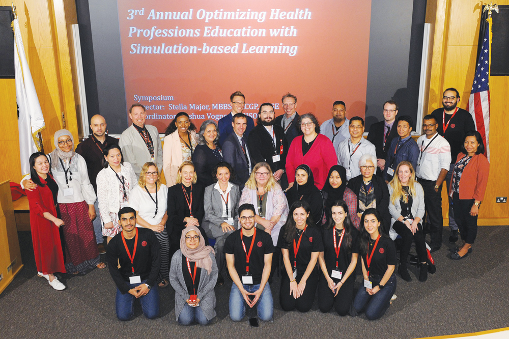 Experts on simulation-based education with healthcare practitioners pose during the WCM-Q symposium. 
