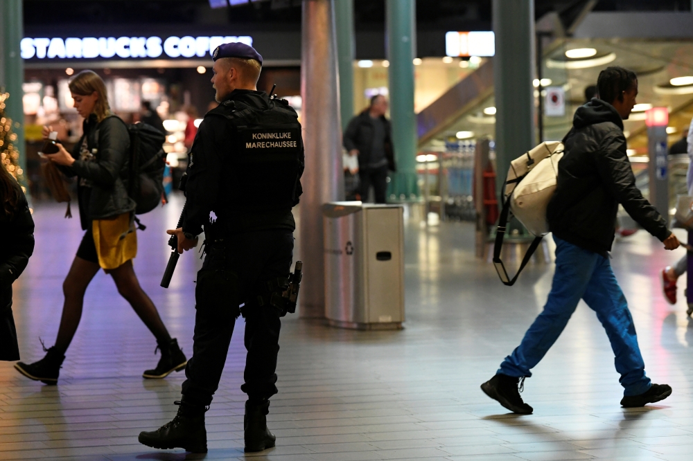 Dutch police patrol at Amsterdam's Schiphol airport after a suspicious incident proved to be a false alarm, Netherlands November 6, 2019. REUTERS/Piroschka van de Wouw