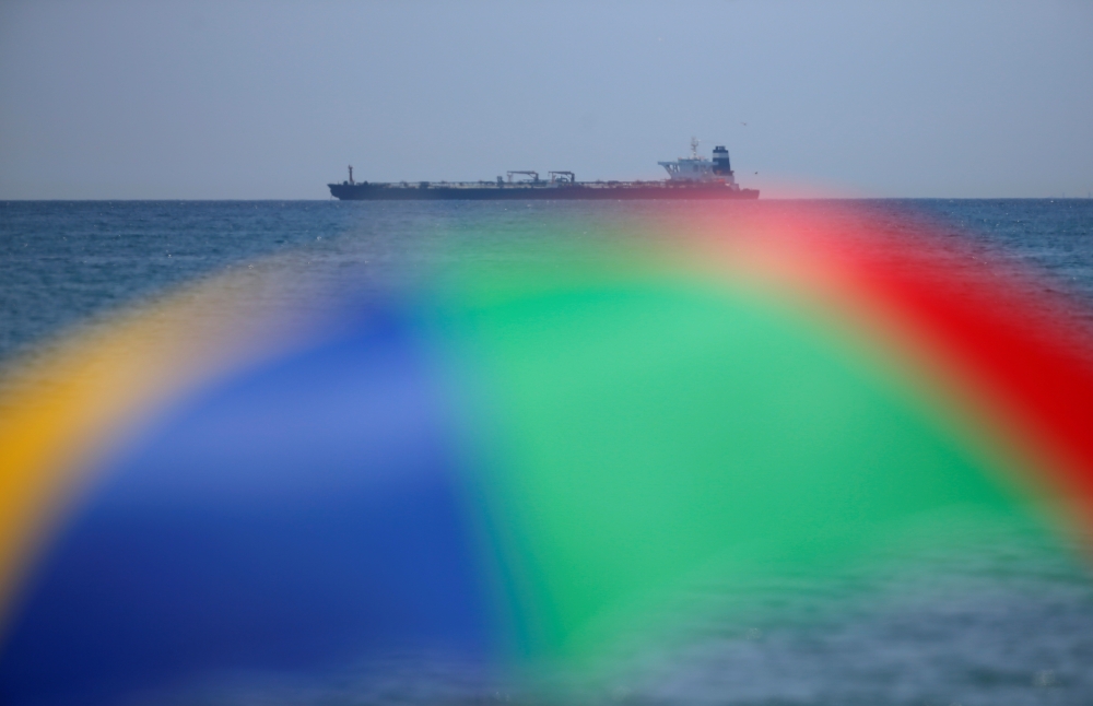The oil supertanker Grace 1 sits anchored in waters of the British overseas territory of Gibraltar, seen from the Spanish city of La Linea de la Concepcion, July 4, 2019. Reuters / Jon Nazca