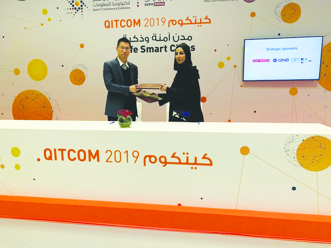 The officials during the signing ceremony.