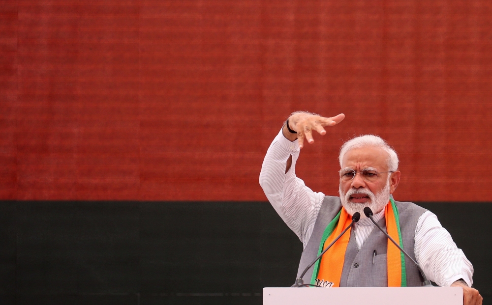 Indian Prime Minister Narendra Modi gestures at an event to present the Bharatiya Janata Party election manifesto in New Delhi on April 8, 2019. AFP