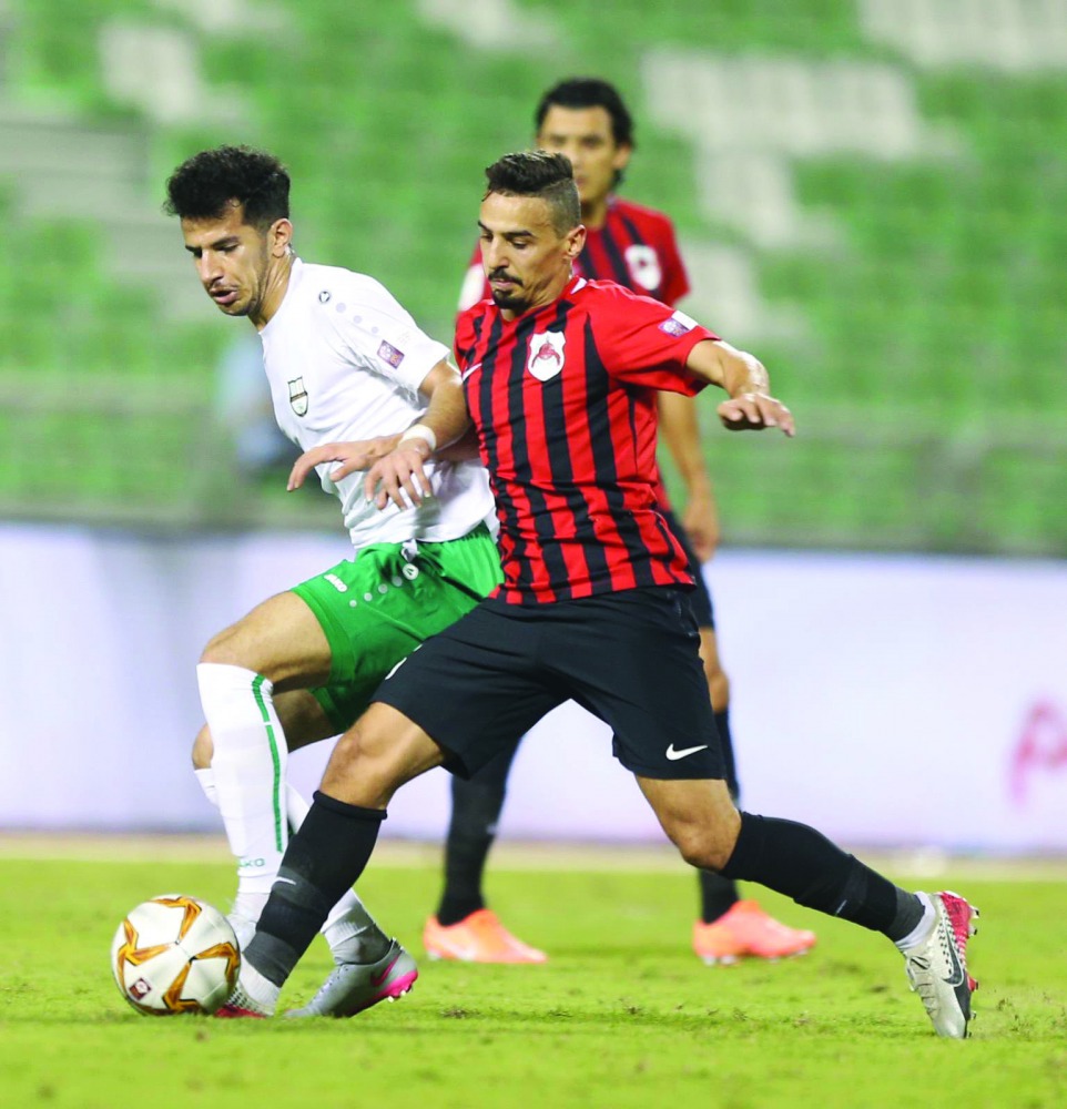 Al Rayyan and Al Ahli players vie for ball possession during their Ooredoo Cup Round 2 match at Al Ahli Stadium, on Friday in this file picture.