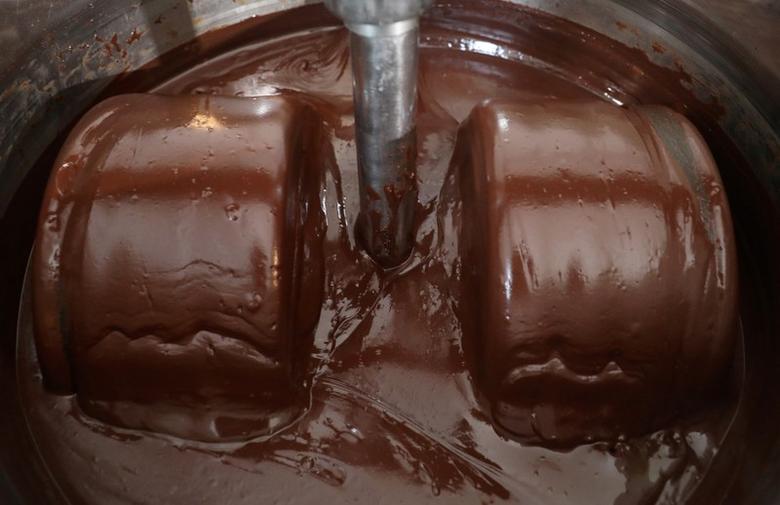Handmade organic raw chocolate made with cocoa beans ground with the help of a bicycle is seen at a factory in Abidjan, Ivory Coast January 10, 2019. Reuters/Luc Gnago