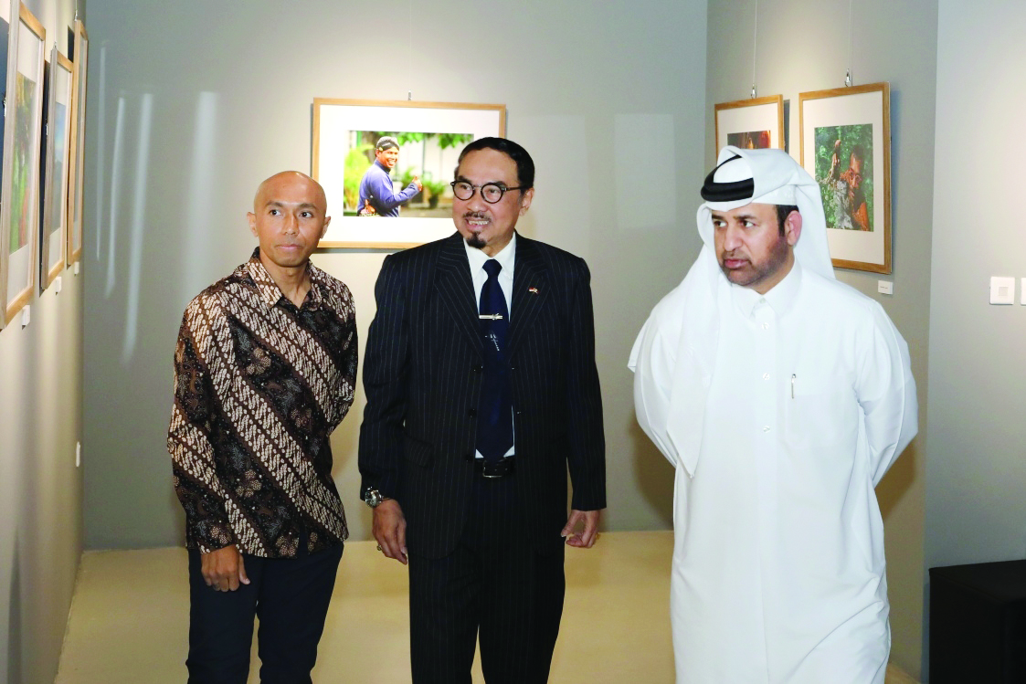 FROM LEFT: Indonesian travel photographer, Josua Alessandro; Indonesian Ambassador, Muhammad Basri Sidehabi, and Katara General Manager, Dr. Khalid bin Ibrahim Al Sulaiti, at the opening of “The Land of Hope” exhibition at Katara Building 22 on Thursday.