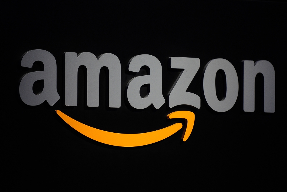 In this file photo taken on September 28, 2011 the Amazon logo is seen on a podium during a press conference in New York / AFP / Emmanuel DUNAND
