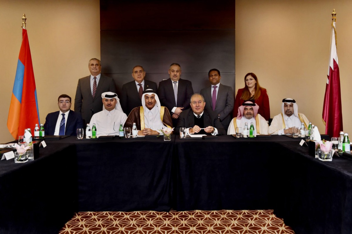 The President of Armenia, Armen Sarkissian (sitting, fourth left), with  QBA members and other officials during the event.