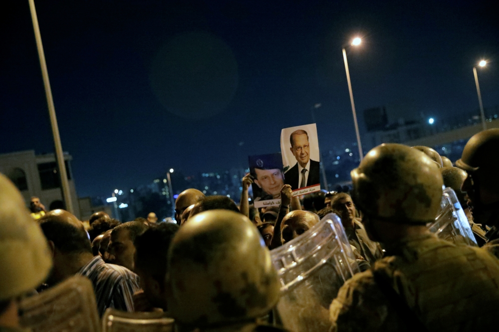 Supporters of Lebanon's President Michel Aoun take part in a demonstration in Hazmiyeh, Lebanon November 26, 2019. REUTERS/Andres Martinez Casares