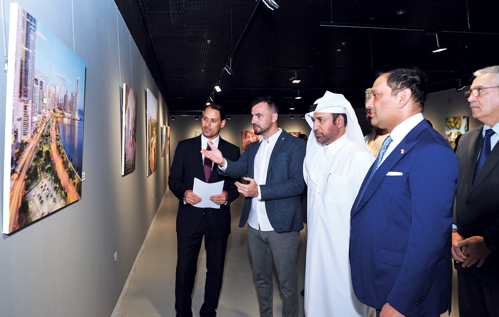 The Ambassador of Panama to Qatar, Mousa Abdelhae Kasvat Kasu (second right); with Dr. Khalid bin Ibrahim Al Sulaiti (centre), General Manager of Katara Cultural Village; and other guests touring ‘Panama and the Time’, a photo exhibition by Agustin Goncal