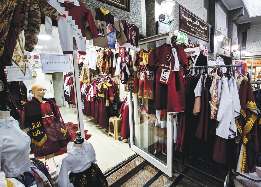 Shops in Souq Waqif stock up souvenirs and gifts for Qatar National Day.
Pic: Qassim Rahmatullah/The Peninsula