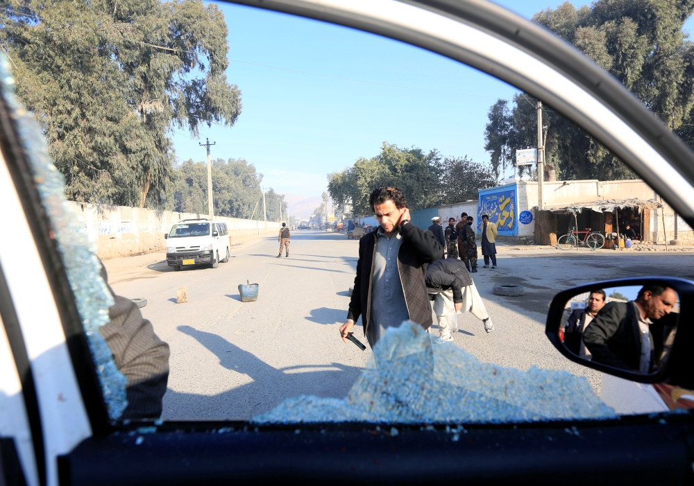 A broken window of the vehicle that was carrying Japanese doctor Tetsu Nakamura during the attack is seen in Jalalabad, Afghanistan December 4, 2019.REUTERS/Parwiz