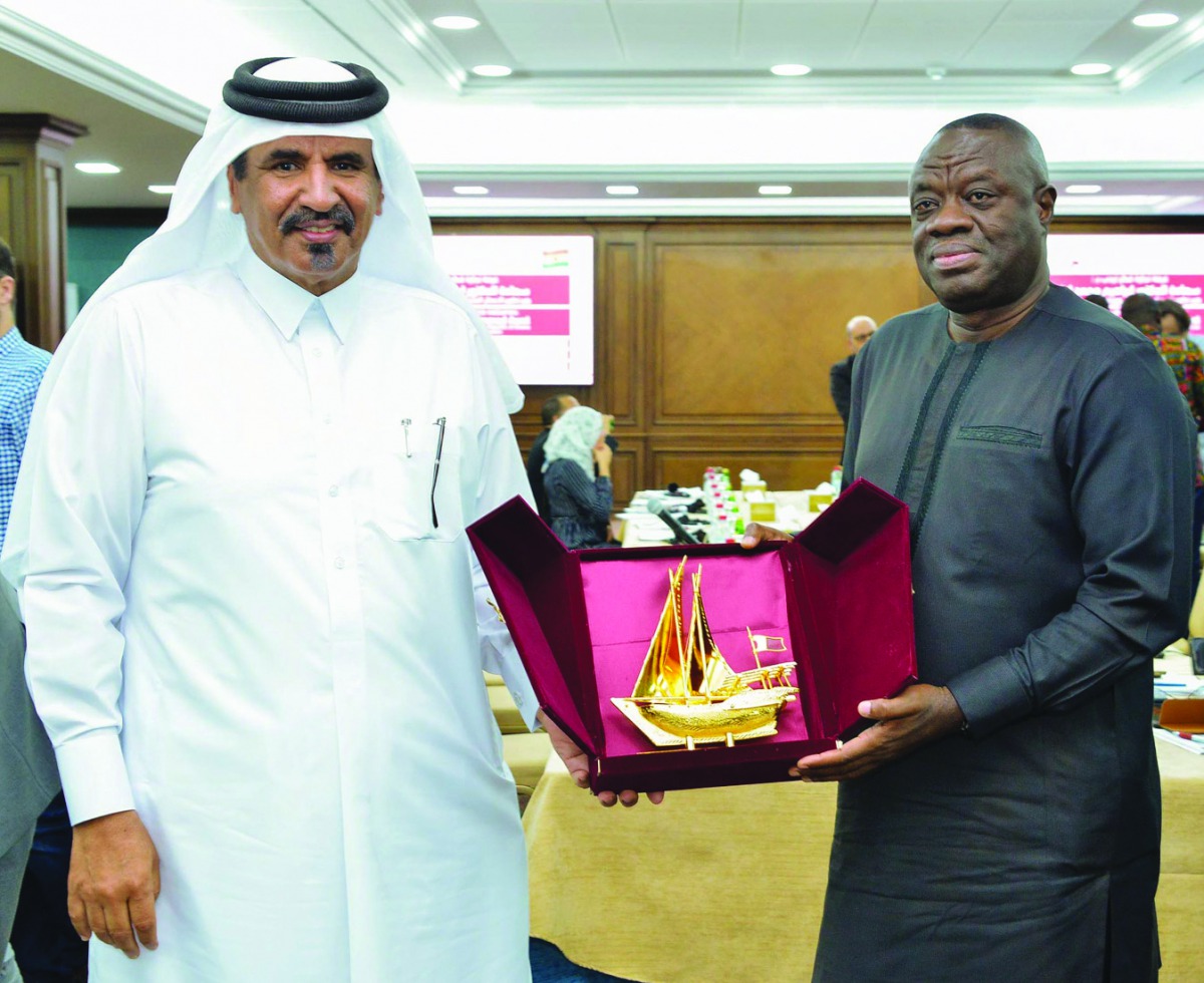 Mohamed bin Ahmed bin Towar Al Kuwari (left), Qatar Chamber’s First Vice-Chairman, presenting a memento to the visiting Ghanaian Minister of Business Development, H E Dr Ibrahim Mohammed Awal, yesterday.