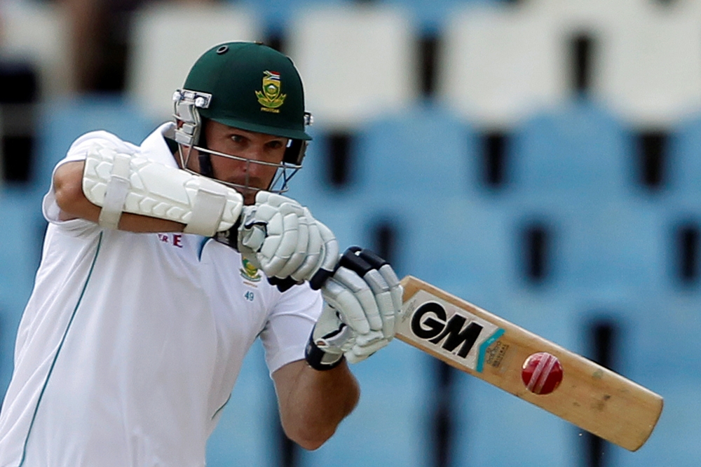 Graeme Smith plays a shot during the second day of their cricket test  February 13, 2014. REUTERS/Siphiwe Sibeko 
