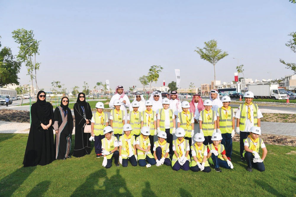 Students from Iqra English School participate in tree planting activity in line with the Ashghal’s ‘Qatar beautification and our kids planting trees’ campaign at the Fereej Kulaib Plaza.