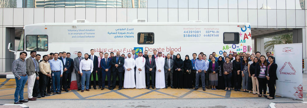 Officials from Qatar Insurance Group and HMC during the blood donation campaign at QIC Headquarters in West Bay.
