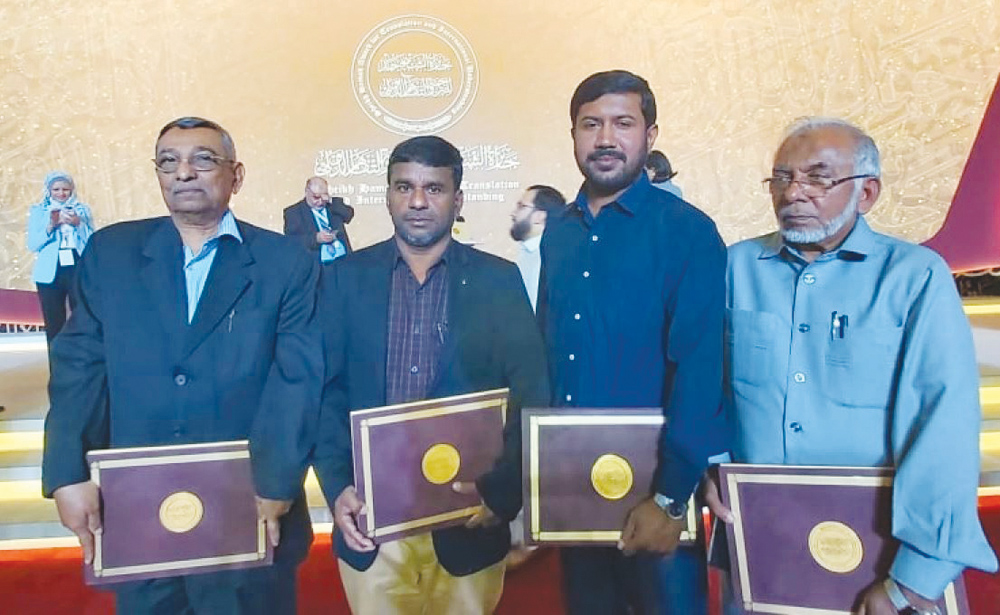 From left: V Abdul Kabeer, K T Hussain, Dr Shamnad and Shaikh Muhammad Karakkunnu with the awards.