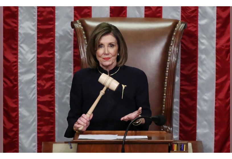U.S. Speaker of the House Nancy Pelosi (D-CA) wields the gavel as she presides over the House of Representatives approving two counts of impeachmeant against U.S. President Donald Trump in the House Chamber of the U.S. Capitol in Washington, U.S., Decembe