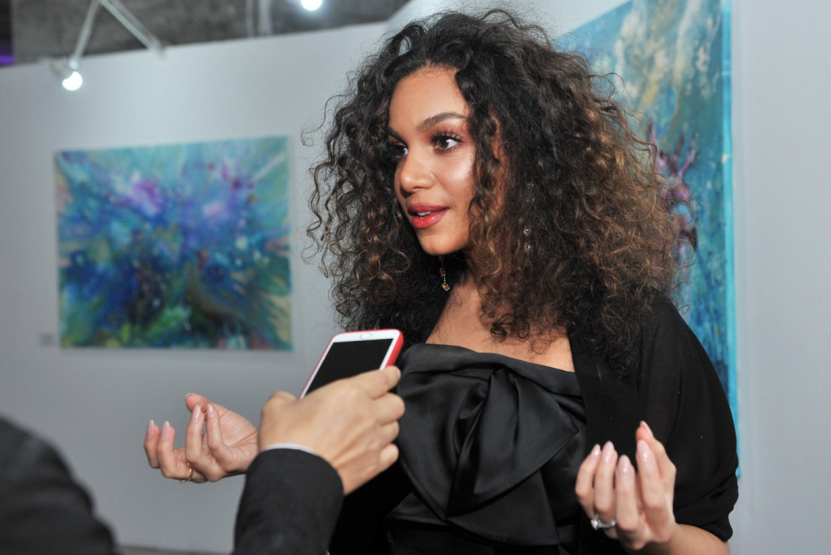 Contemporary artist Hala El Attar speaking to The Peninsula at the opening of her solo exhibition “Different Dimension:  An Energetic Place” at W Doha’s Art 29 yesterday. Pic: Baher Amin/The Peninsula
