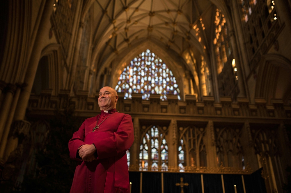 Stephen Cottrell, the current Bishop of Chelmsford, poses for photographs inside York Minster in York, northern England on December 17, 2019.  AFP / Oli Scarff
