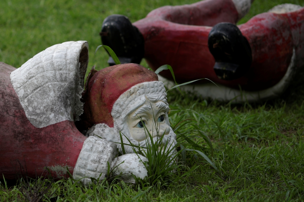 Christmas toys and sculptures are seen in the abandoned Park Albanoel in the city of Itaguai, near Rio de Janeiro, Brazil, December 20, 2019. Reuters/Ueslei Marcelino
 