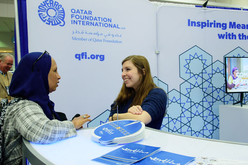 A staff sharing memories during the celebrations organised to mark 10 years of inspiring meaningful connections with the Arab world at Conrad Hotel in Washington, DC. 