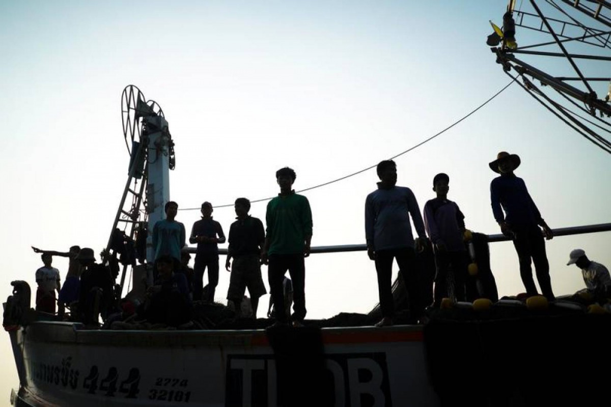 Migrant workers prepare to unload their catch at a port in Samut Sakhon province, Thailand, January 22, 2018. Reuters / Athit Perawongmetha