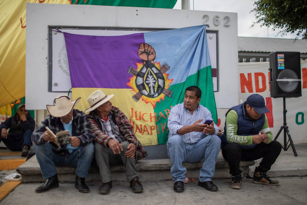 Indigenous activists hold a protest outside the ministry of well-being in the city of Morelia, Michoacan, November 26, 2019. Thomson Reuters Foundation/Alan Ortega