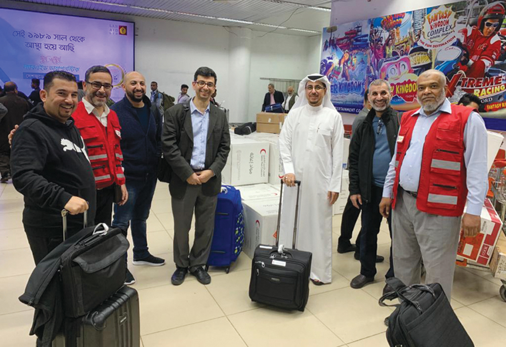 The members of a medical convoy to Bangladesh, under the Little Hearts programme launched by Qatar Red Crescent Society.