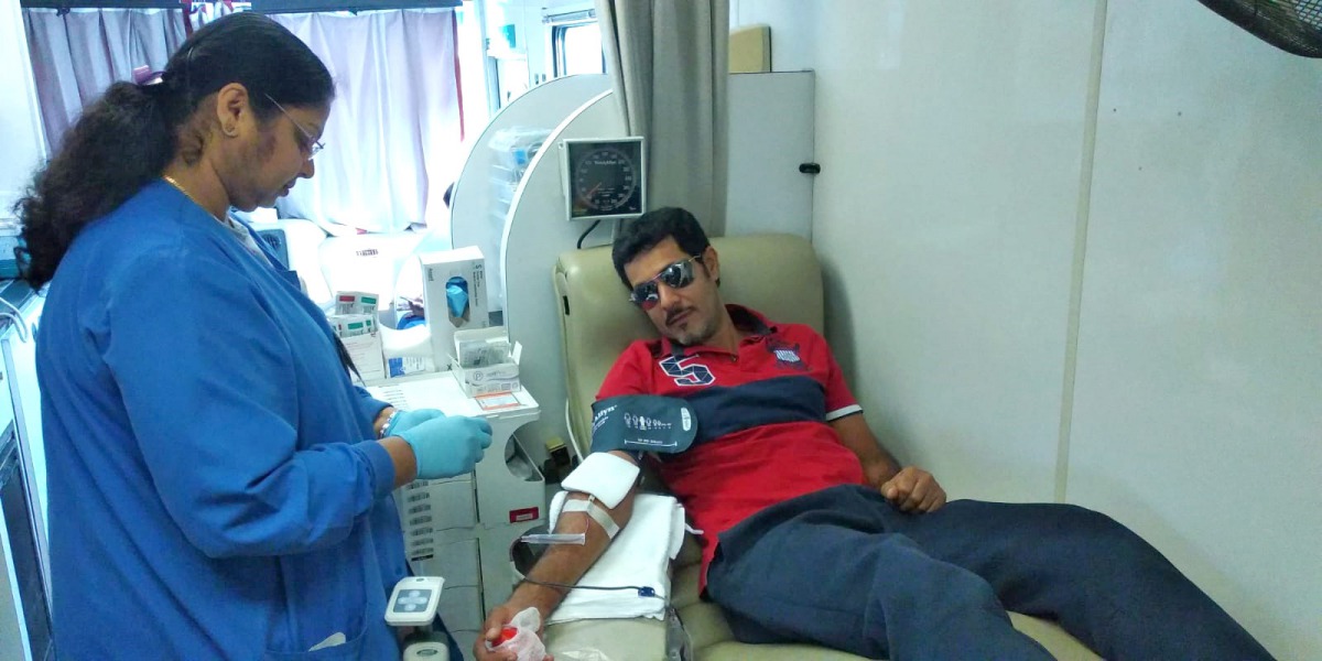 A person donating blood under the MME blood donation campaign.  