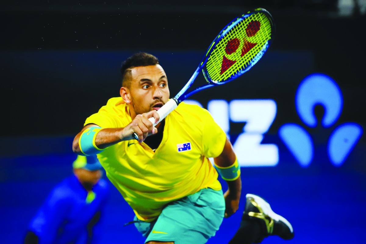 Nick Kyrgios of Australia hits a return against Stefanos Tsitsipas of Greece during the men's singles match on day five of the ATP Cup tennis tournament in Brisbane on January 7, 2020. AFP / Patrick Hamilton 
