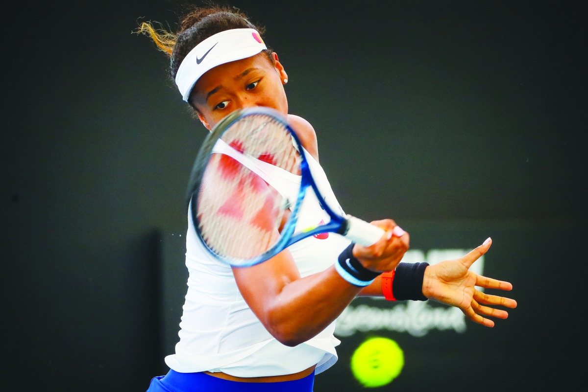 Naomi Osaka of Japan hits a return against Maria Sakkari of Greece during the women's singles match on day two of the Brisbane International tennis tournament in Brisbane on January 7, 2020. AFP / Patrick Hamilton