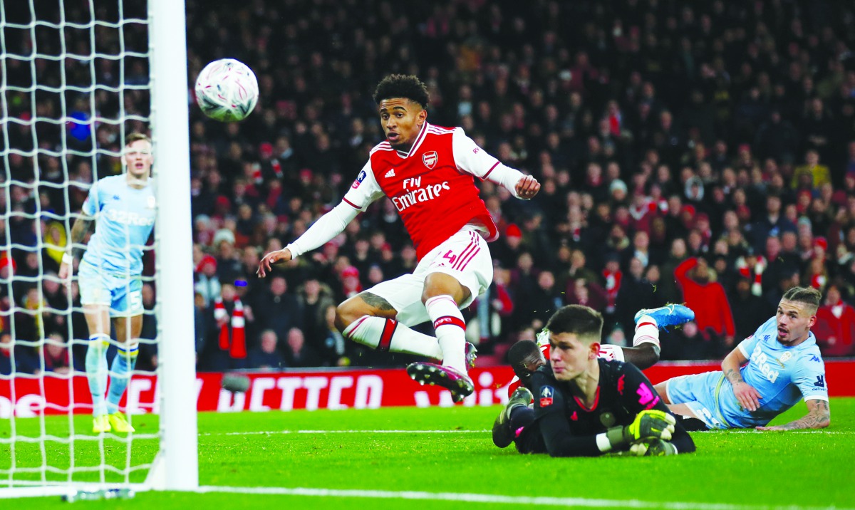 Arsenal's Reiss Nelson scores their first goal. Reuters/Eddie Keogh