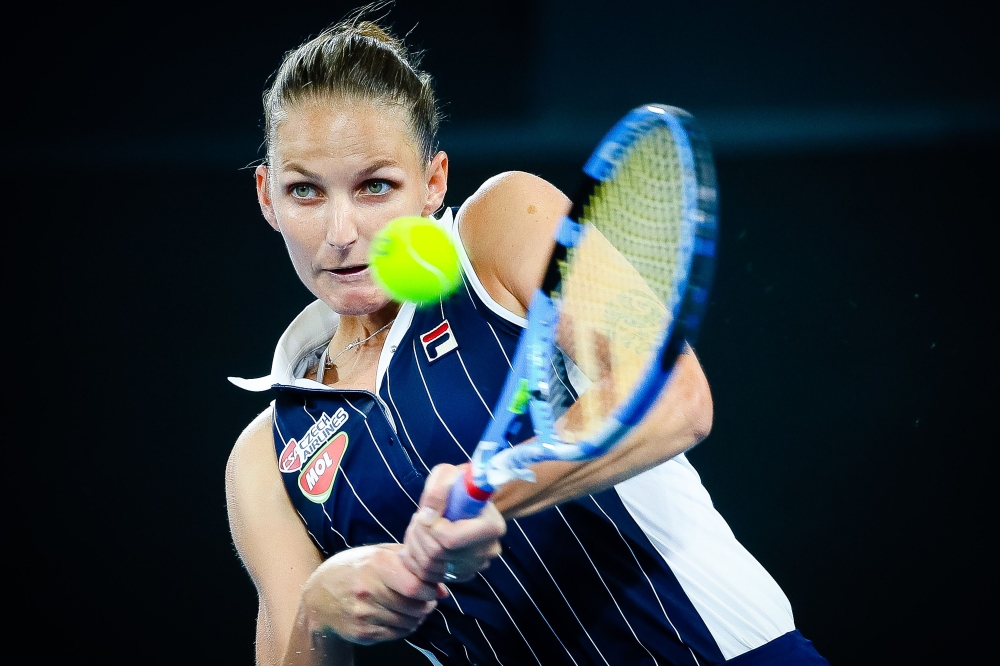 Karolina Pliskova of the Czech Republic hits a return to Naomi Osaka of Japan during the women's Semi Final match in the Brisbane International tennis tournament in Brisbane on January 11, 2020. AFP / AFP / Patrick Hamilton  