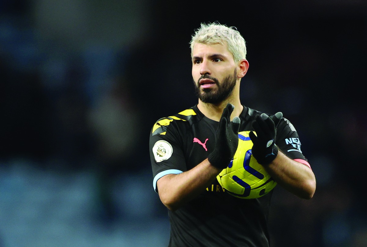 Manchester City's Sergio Aguero celebrates with the match ball at the end of the game, Premier League, Aston Villa v Manchester City, Villa Park, Birmingham, Britain, January 12, 2020. Reuters/Carl Recine