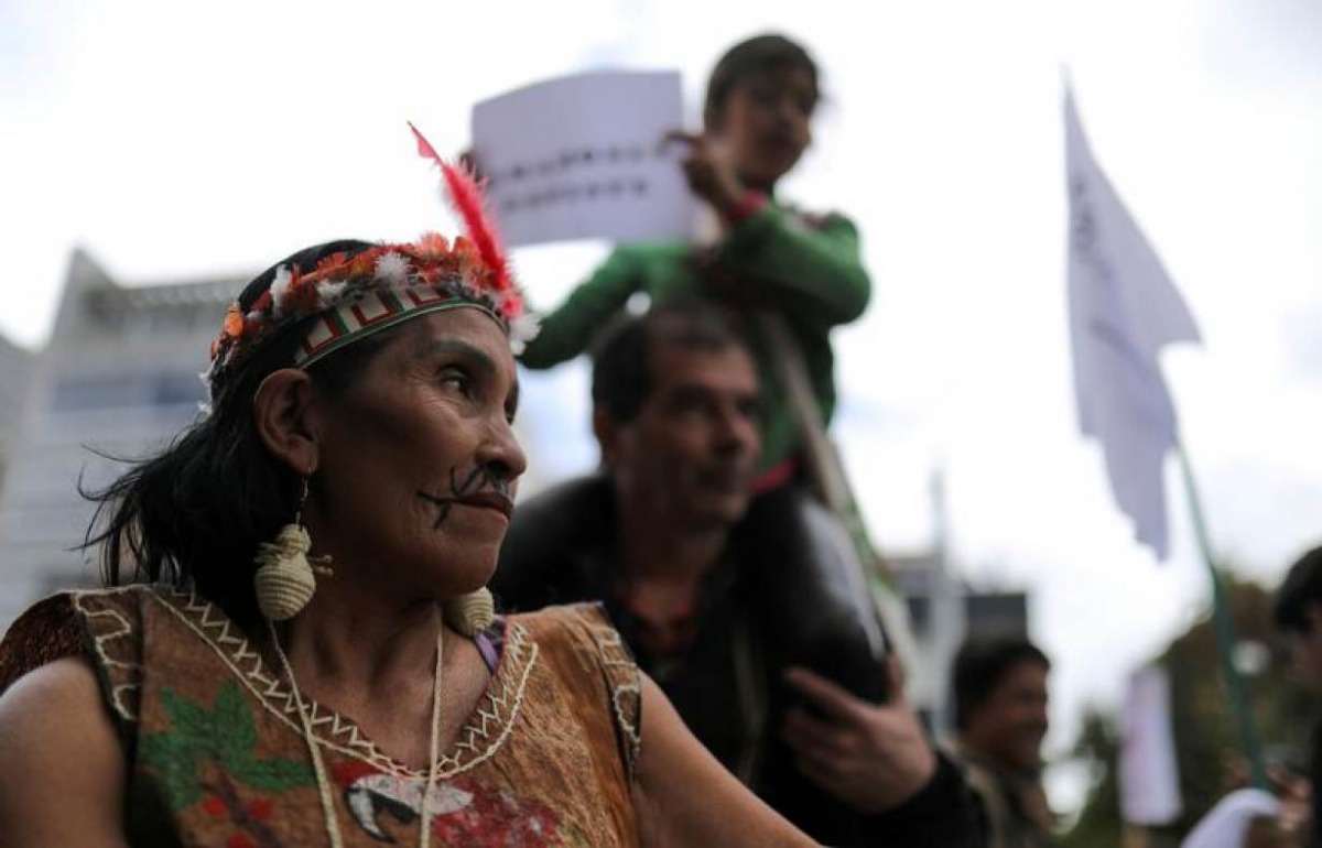 An indigenous woman looks on as she attends a protest outside the Brazilian embassy after the Amazon wildfires in in Bogota, Colombia, August 23, 2019. Reuters / Luisa Gonzalez