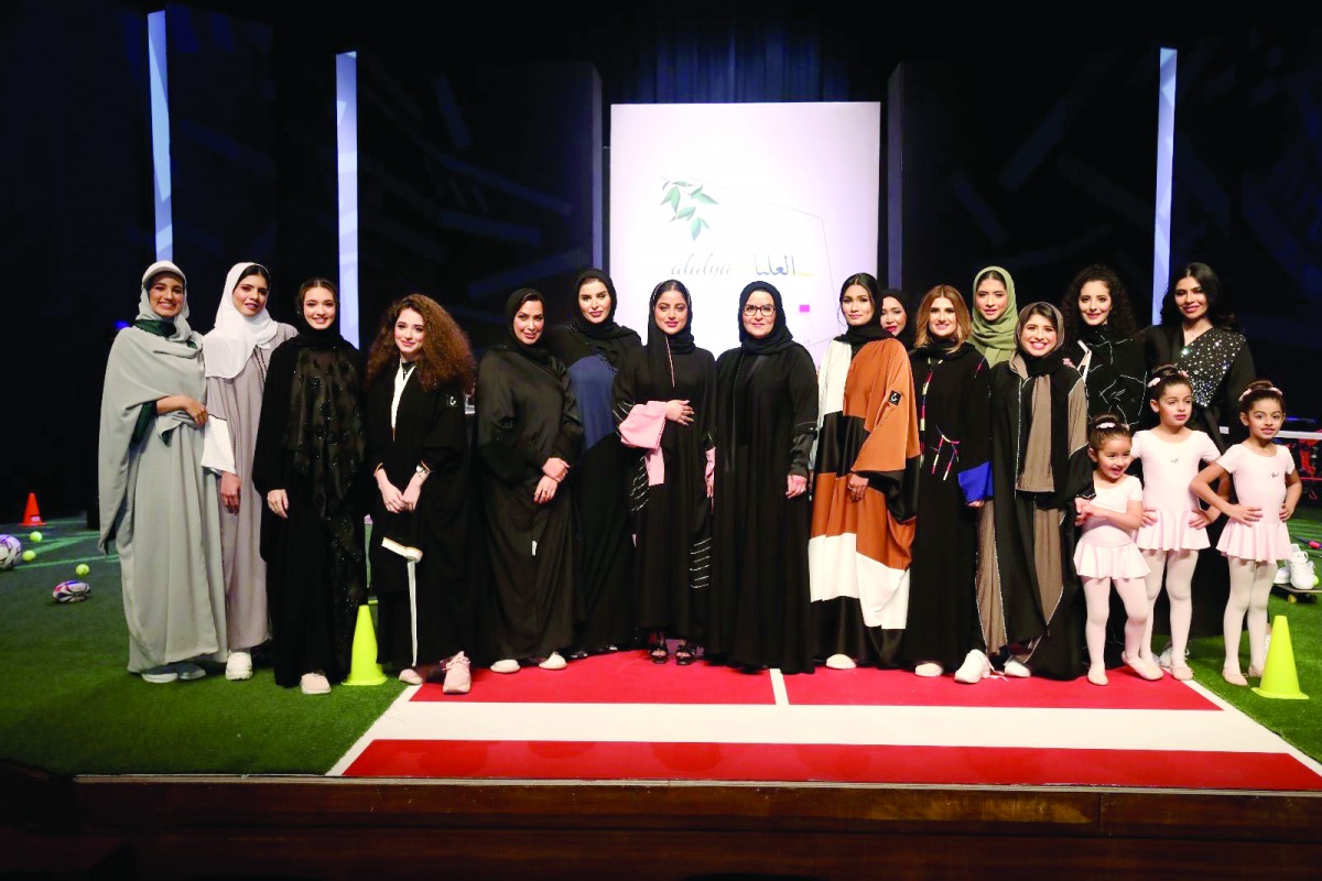 Qatari fashion designer, Alia Al Suwaidi, during her first exhibition of sports Abayas (gown). 