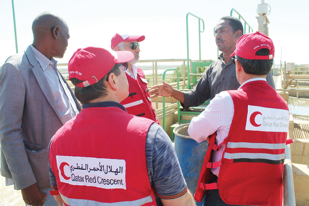 Officials during a field visit to a water plant.
