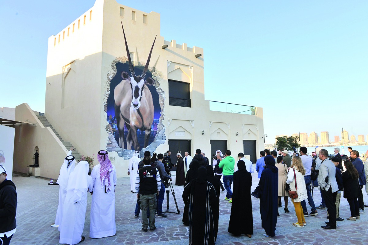 People look at the latest mural created by internationally acclaimed Argentine artist Martin Ron during its unveiling at Katara Building 40 yesterday. Pic: Baher Amin/The Peninsula