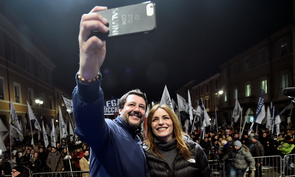 Leader of Italy's far-right League party Matteo Salvini takes a selfie with Lucia Borgonzoni, rightwing coalition candidate for President of Emilia-Romagna, during a rally ahead of a regional election in Emilia-Romagna, in Ravenna, Italy, January 24, 2020