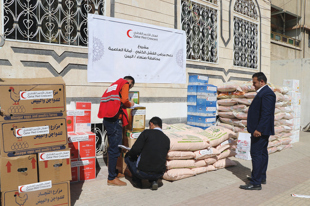 QRCS officials deliver food and medical supplies in Yemen.
