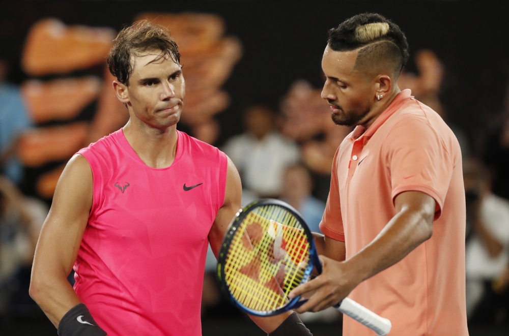 Spain's Rafael Nadal and Australia's Nick Kyrgios react after the match. REUTERS/Issei Kato