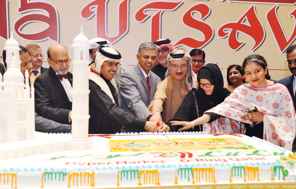 Indian Ambassador, H E P. Kumaran (centre), cutting a cake with other officials during the opening of India Utsav 2020 at Lulu Hypermarket, D Ring Road, on Monday.Pics: Abdul Basit/The Peninsula