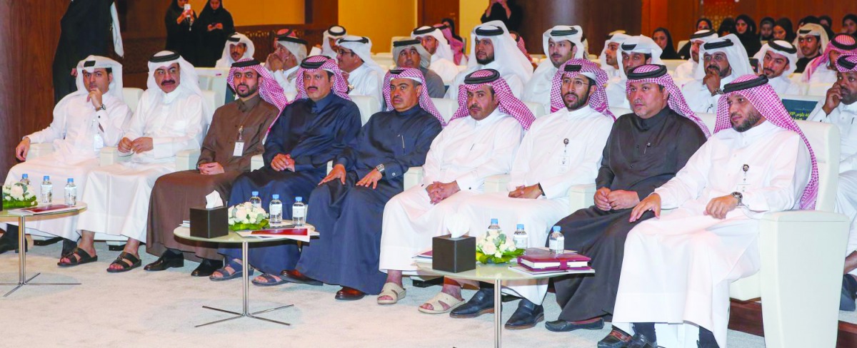 H E Ali bin Ahmed Al Kuwari (front, centre), Minister of Commerce and Industry, and other officials at the annual ceremony to celebrate the Ministry’s achievements under the theme “2019 Harvest”, yesterday. 