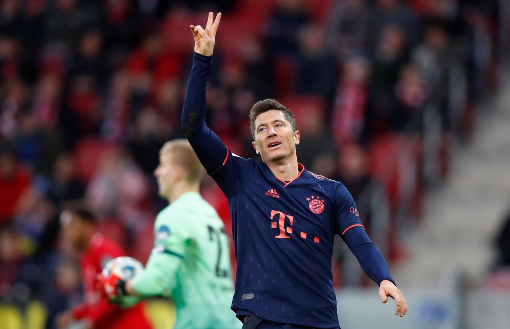Bayern Munich's Robert Lewandowski reacts REUTERS/Wolfgang Rattay 