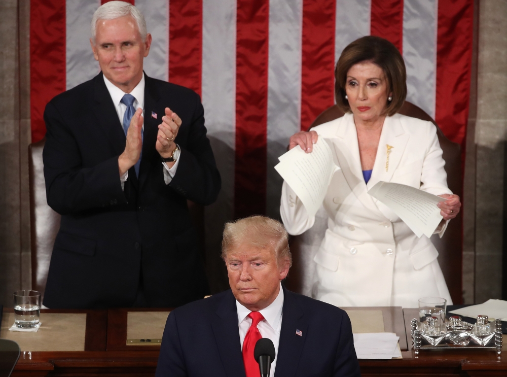 House Speaker Rep. Nancy Pelosi (D-CA) rips up pages of the State of the Union speech after U.S. President Donald Trump finishes his State of the Union speech in the chamber of the U.S. House of Representatives on February 04, 2020 in Washington, DC. Mark