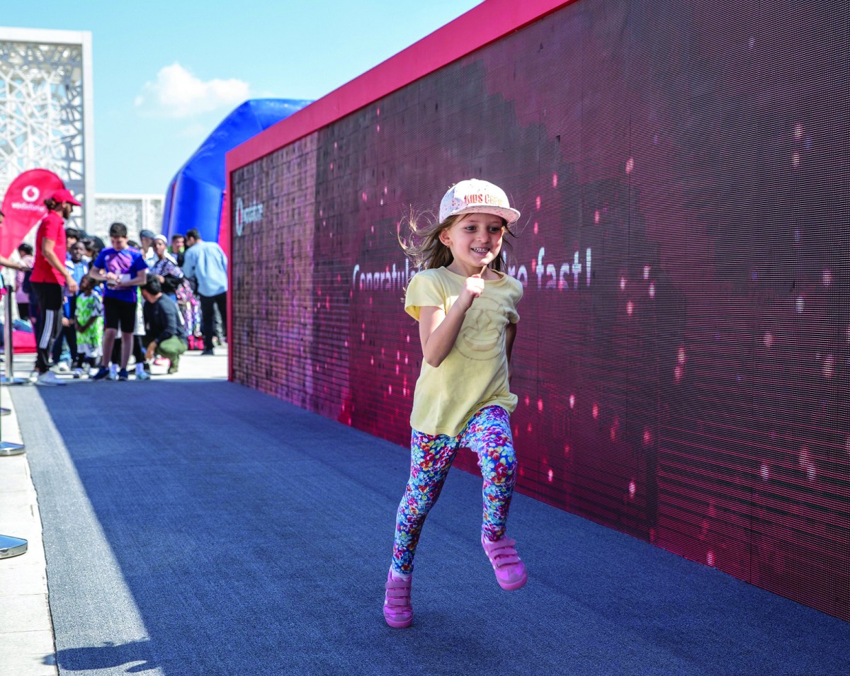This file picture of a child taking part in a competition as part of Qatar Foundation’s National Sport Day celebrations. 
